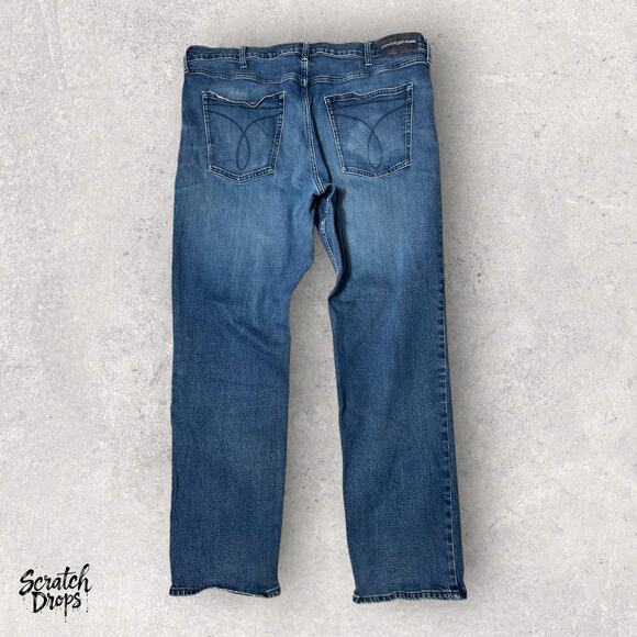 Calvin Klein Jeans Mens Distressed Blue Denim Straight Leg Vintage Fit Pants - Picture 7 of 7